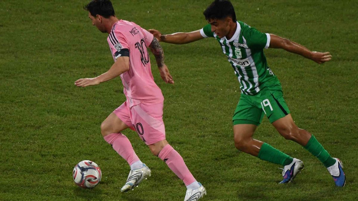 Lionel Messi y Juan Manuel Rengifo