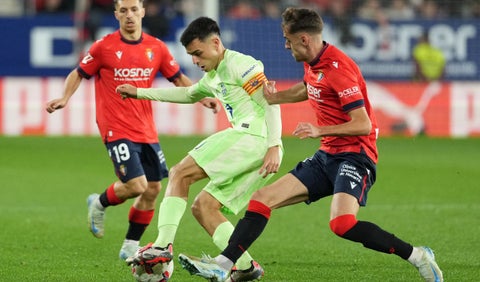 Jugadores del Barcelona y Osasuna