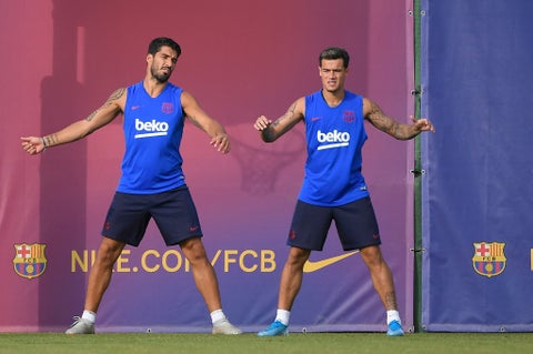 Suárez y Coutinho en un entrenamiento con el FC Barcelona