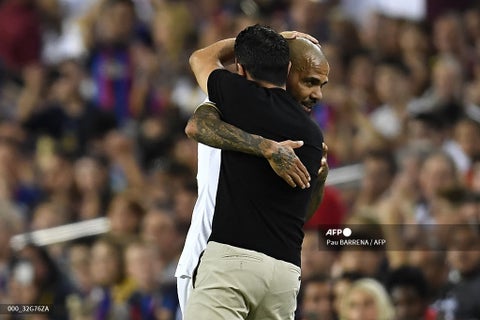 Dani Alves y Xavi Hernández