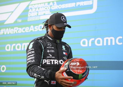 Hamilton recibe el casco del hijo de Michael Schumacher