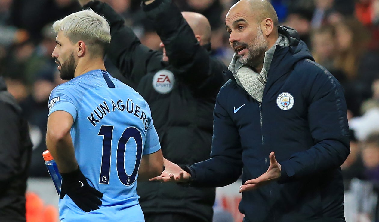 Sergio Agüero y Josep Guardiola