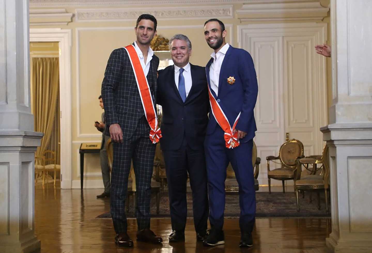 Robert Farah y Juan Sebastián Cabal, junto al presidente Iván Duque.