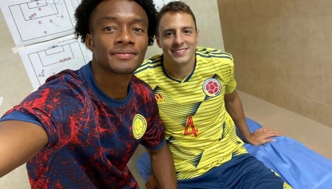 Juan Guillermo Cuadrado y Santiago Arias