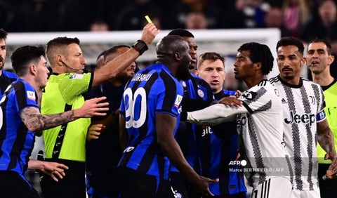 Juan Guillermo Cuadrado y Romelu Lukaku