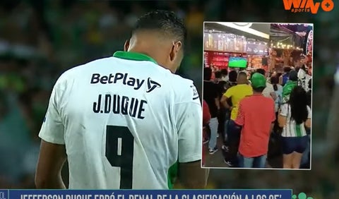 Hinchas tras el penal botado de Duque, Nacional