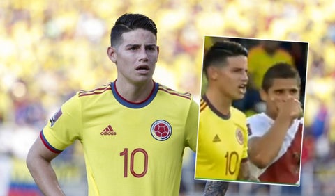 James Rodríguez y defensor peruano