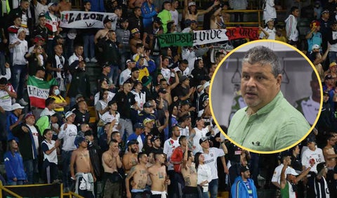 Hinchas de Once Caldas y Tulio Mario Castrillón