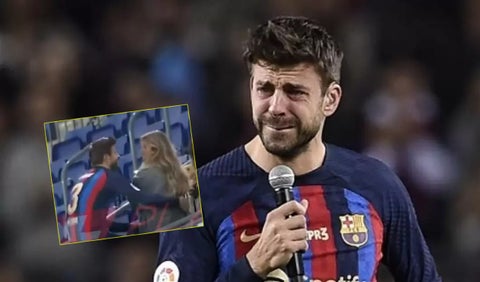 Piqué y Clara Chía abrazándose en el Camp Nou