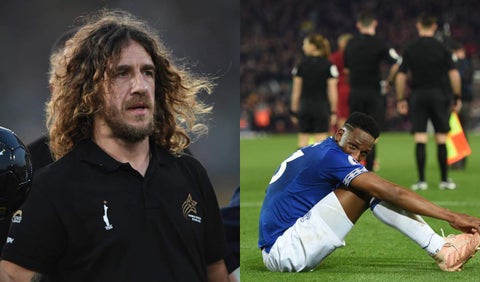 Carles Puyol y Yerry Mina