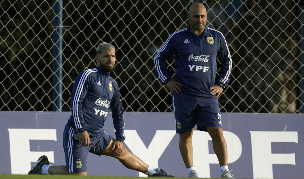 Sergio Agüero y Pep Guardiola