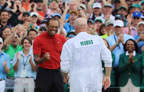 Tiger Woods y su caddie
