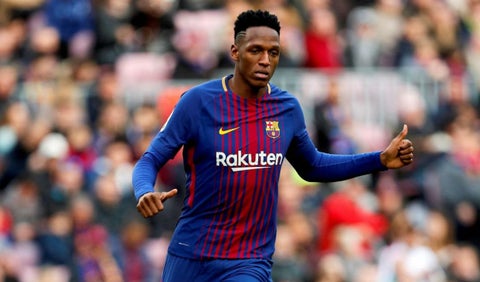 Yerry Mina jugando con el Barcelona